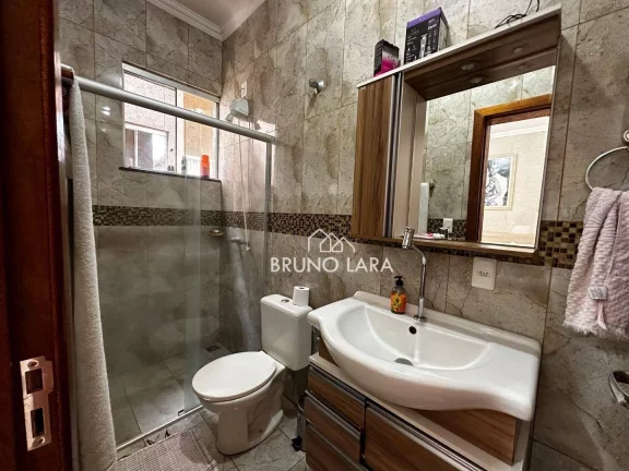 Imagem Casa à venda em Mário Campos Condomínio Serra dos Bandeirantes.