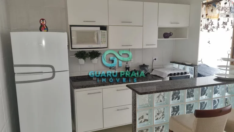 Imagem 1 dormitórios, sala para 2 ambientes com sacada, cozinha com armários planejados, banheiro social e área de serviço