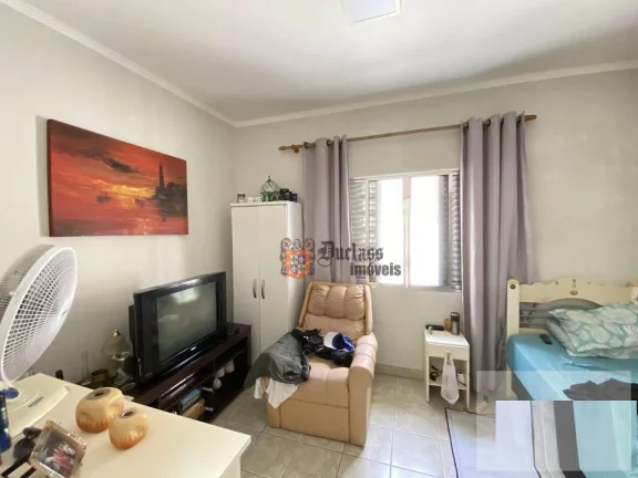 Imagem Casa com 3 dormitórios à venda, 100 m² por R$ 590.000 - Ocian - Praia Grande/SP
