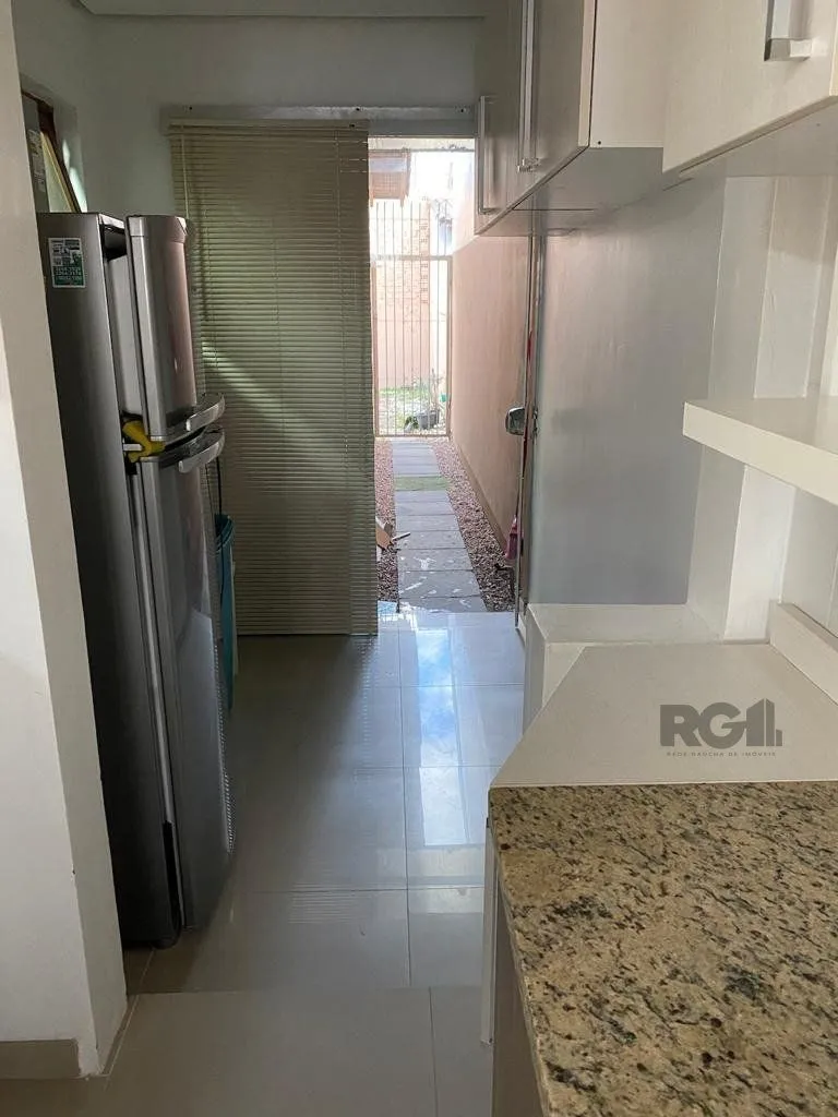 Imagem Casa térrea com 02 dormitórios e 01 vaga, no bairro Aberta dos Morros, em Porto Alegre.