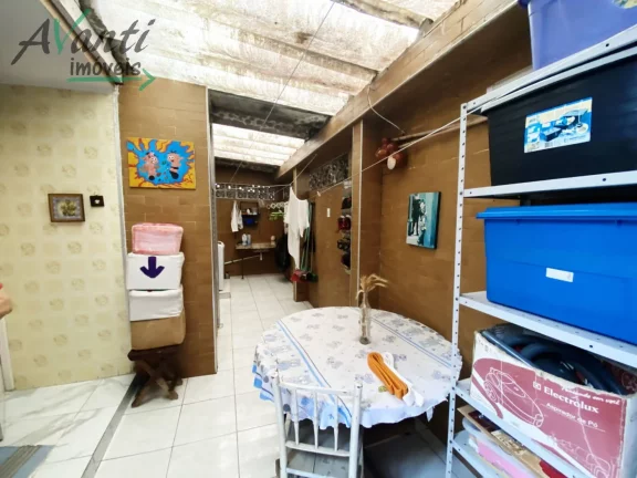 Imagem Sobrado com 3 Quartos e 2 Vagas à venda, no bairro Encruzilhada em Santos - SP