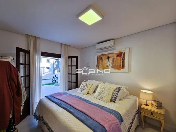 Imagem Casa à venda com 4 dormitórios 2 suítes 275m² de área útil, na Riviera de São Lourenço - Bertioga SP