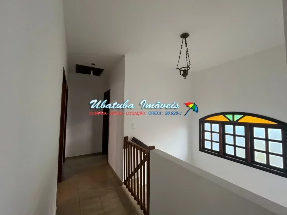 Imagem Sobrado com 03 dormitórios em excelente localização