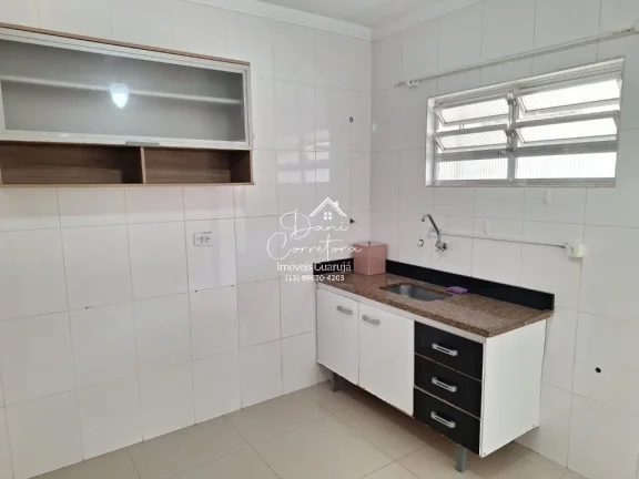Imagem Imperdível oportunidade, apartamento de 2 quartos sem mobília na rua mais desejada do Guarujá-SP - 65m² - 1 vaga de garagem