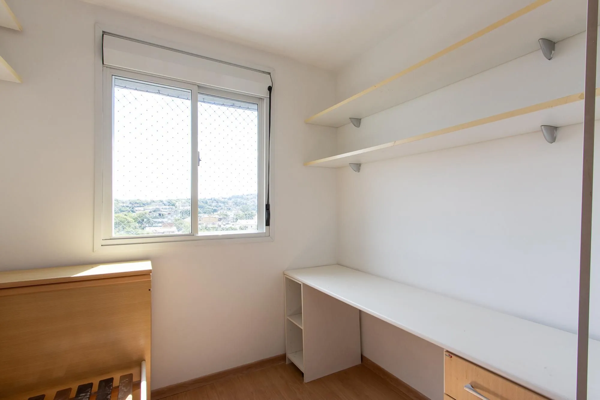 Imagem Apartamento de 3 dormitórios, 1 banheiro e uma vaga de garagem.
