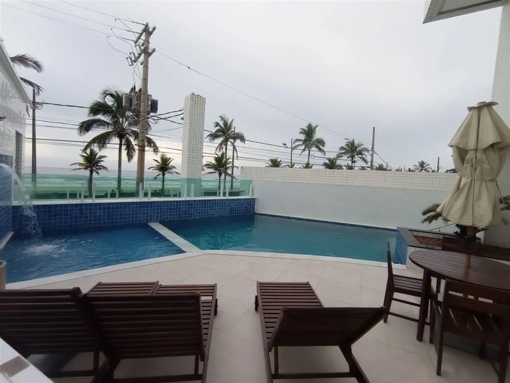 Foto do imóvel APARTAMENTO PREDIO FRENTE MAR 2 QUARTOS 1 SUITE COM LAZER em Centro, Mongaguá - SP