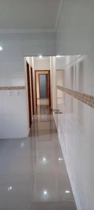 Imagem Casa com 2 dormitórios à venda, 110 m² por R$ 585.000,00 - Maracanã - Praia Grande/SP