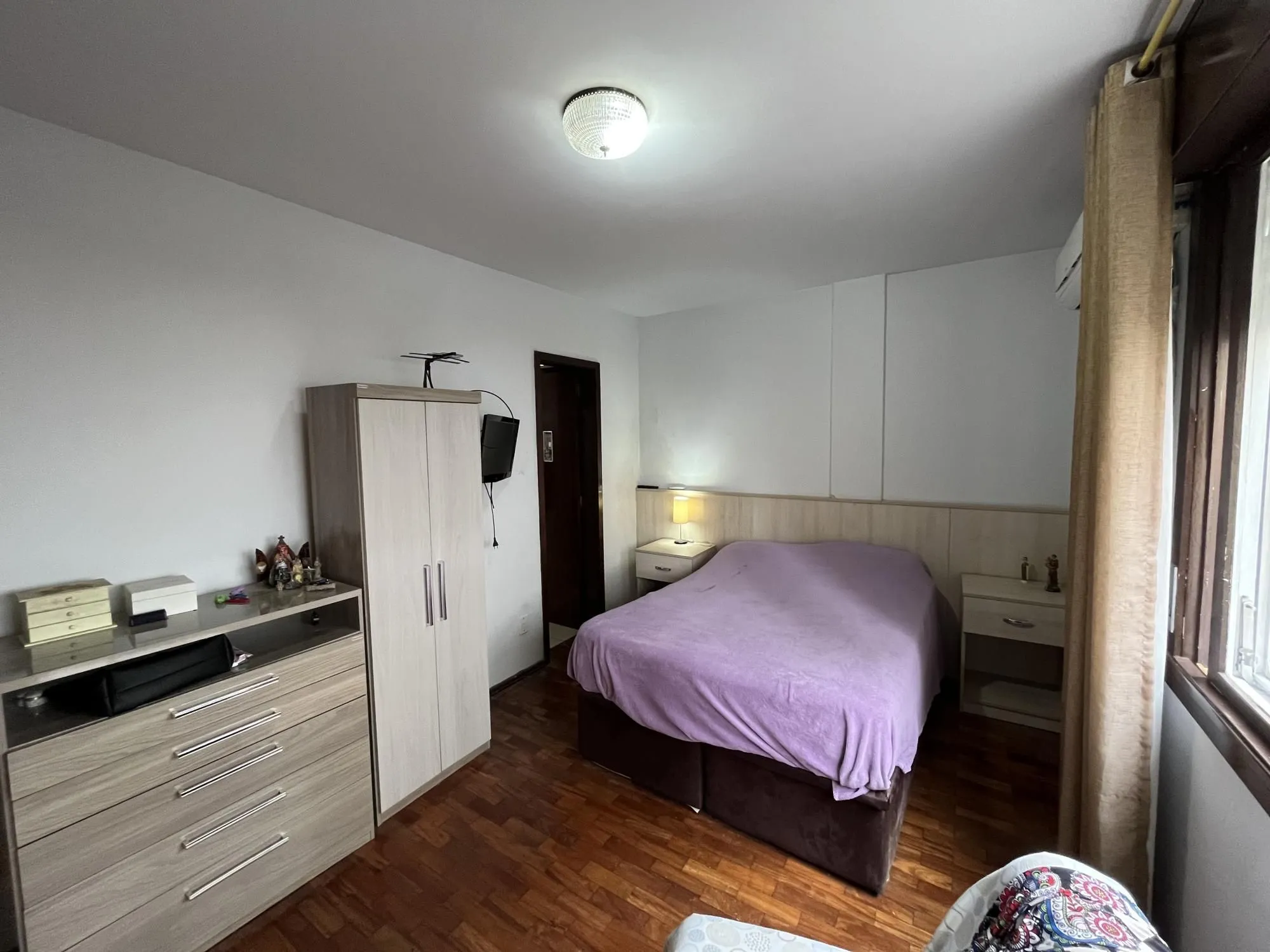 Imagem Apartamento de dois quartos com suíte no bairro Menino Deus em Porto Alegre