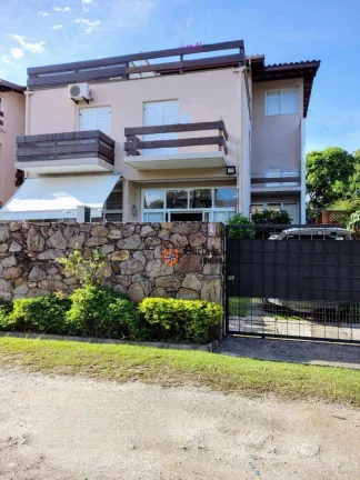 Foto do imóvel Sobrado com 3 dormitórios à venda, 158 m² por R$ 1.200.000 - Praia do Arrastão - São Sebastião/SP