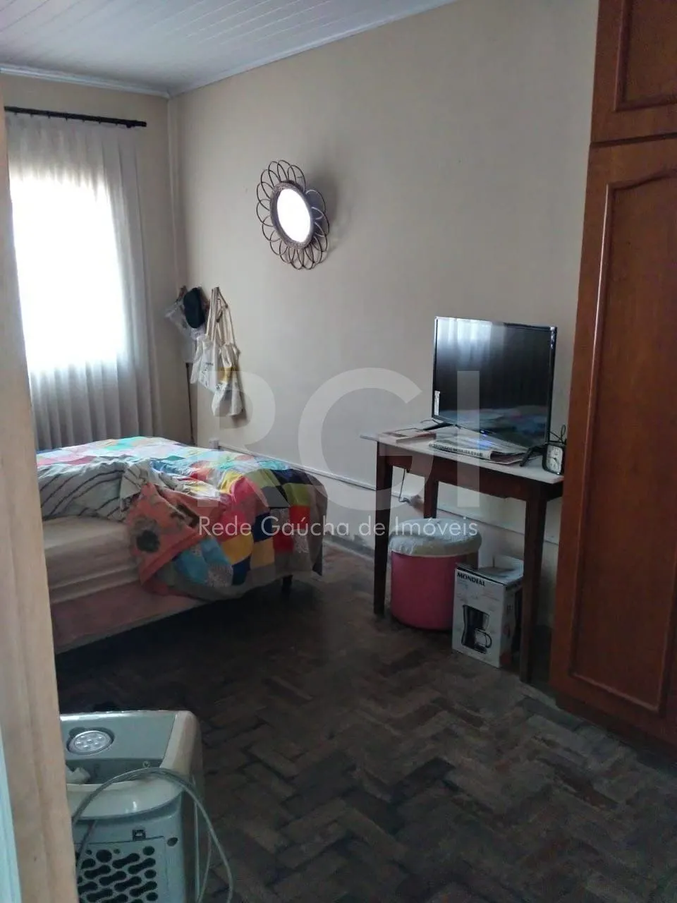 Imagem Casa para Venda - 130m², 2 dormitórios, 1 vaga - Cidade Baixa