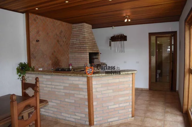 Imagem Casa com 3 dormitórios à venda, 285 m² por R$ 1.250.000,00 - Jardim Toriba - Campos do Jordão/SP
