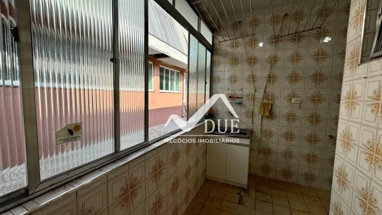 Imagem Casa com 3 dormitórios à venda, 142 m² por R$ 800.000,00 - Encruzilhada - Santos/SP