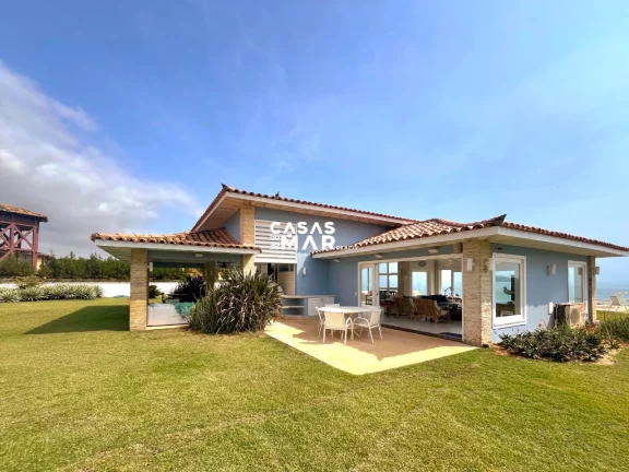 Imagem Residência de luxo à beira-mar em condomínio exclusivo na Praia Rasa, Armação dos Búzios-RJ: 3 suítes, 3 salas, 6 vagas.