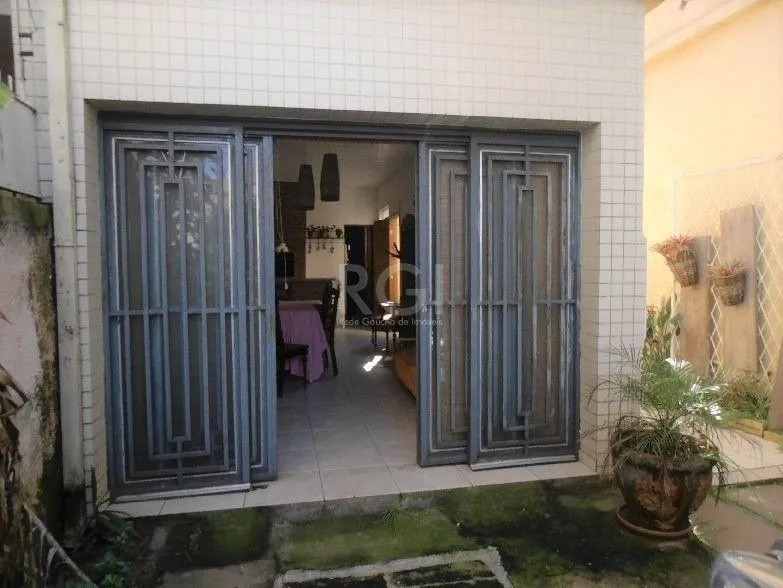 Imagem Casa para Venda - 159m², 3 dormitórios, 3 vagas - Menino Deus