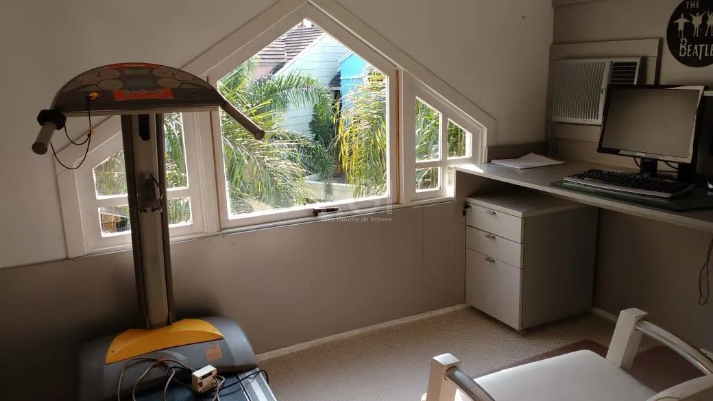 Imagem casa em condomínio fechado, às margens do rio guaíba,