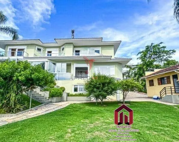Imagem Casa Exclusiva Frente Mar em Florianópolis Cacupé 5 Quartos com Acesso Privativo à Praia