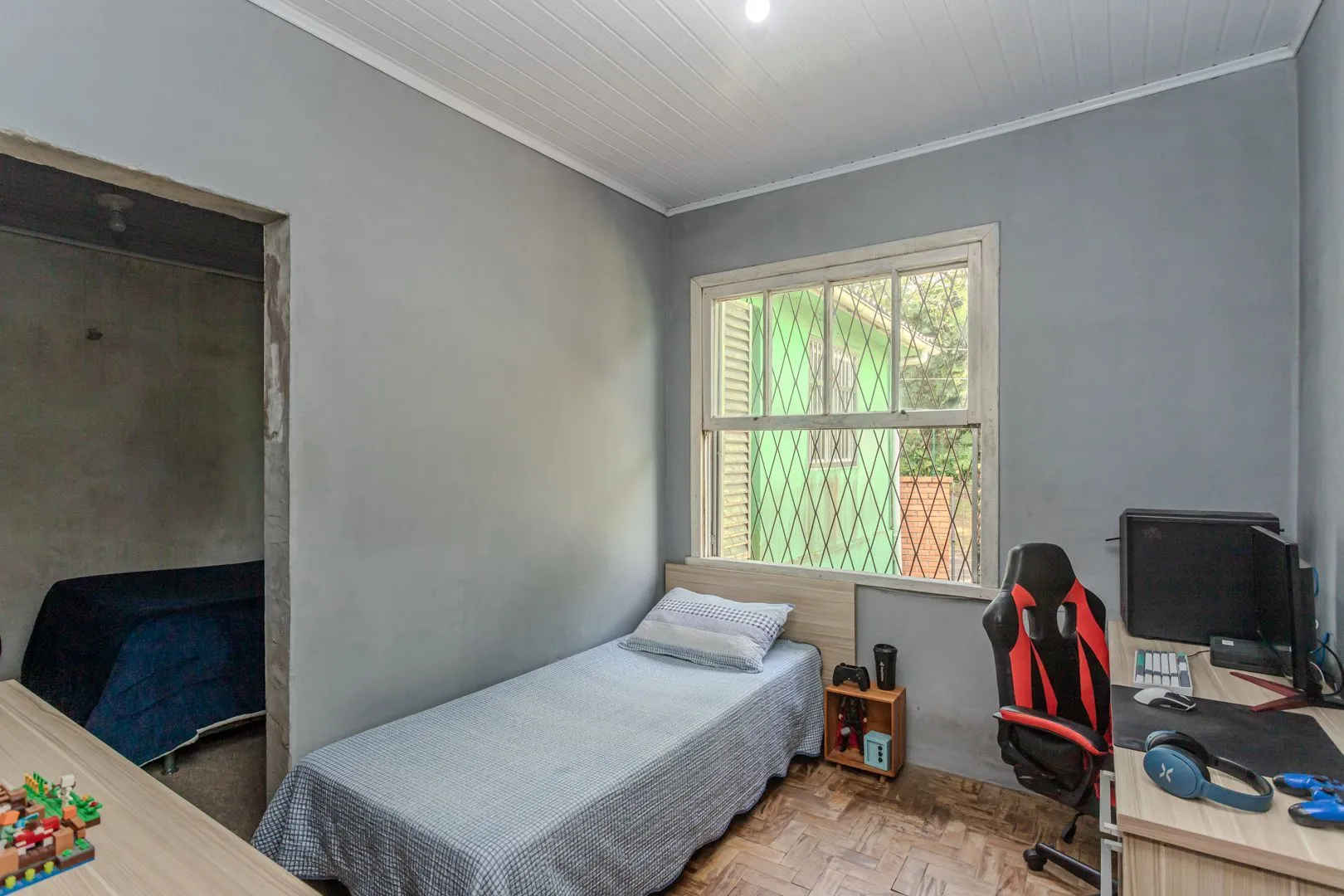 Imagem Casa no bairro Jardim Botânico de 3 dormitórios e garagem e terreno com 370m²