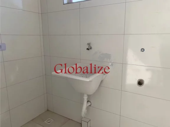 Imagem Casa sobreposta alta à venda com 72m², 2 quartos, 1 suíte, churrasqueira por R$315.000,00 em Santos