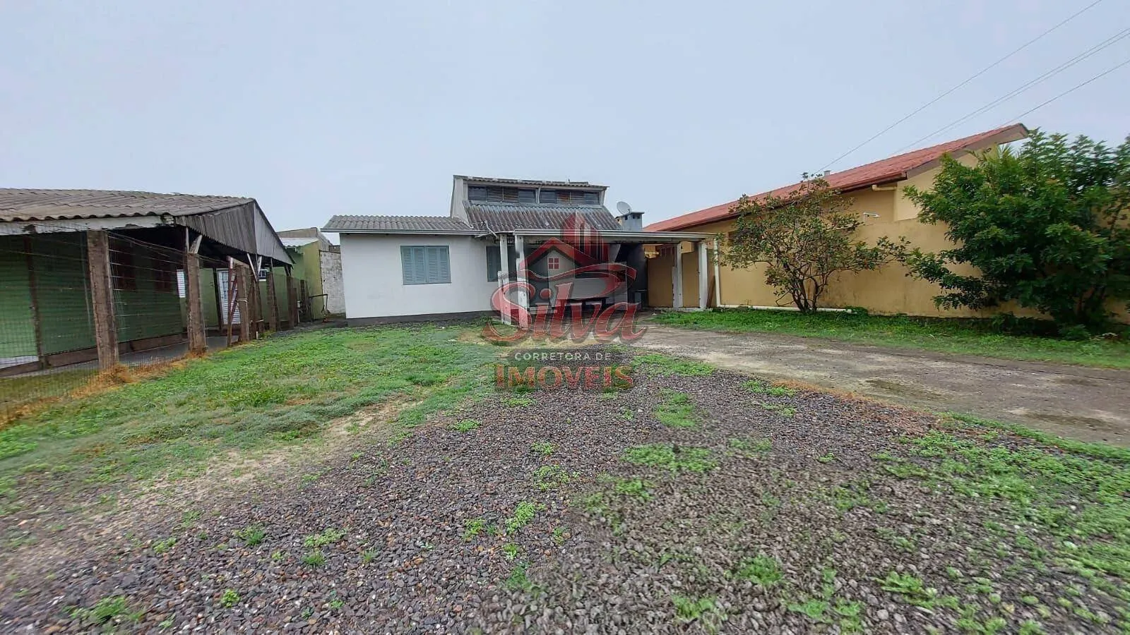 Imagem Casa com suíte à venda em Imbé com lareira e 103m²