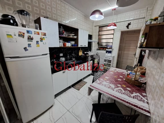 Imagem Apartamento à venda com 94m², 2 quartos, dependência, varanda de frente por R$580.000,00 no Gonzaga em Santos
