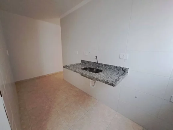 Imagem Apartamento com 2 dormitórios à venda, 56 m² por R$ 320.000 - Caiçara - Praia Grande/SP