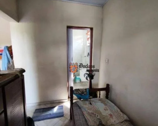 Imagem Sobrado com 3 dormitórios à venda, 250 m² por R$ 300.000 - Jardim Regina - Itanhaém/SP