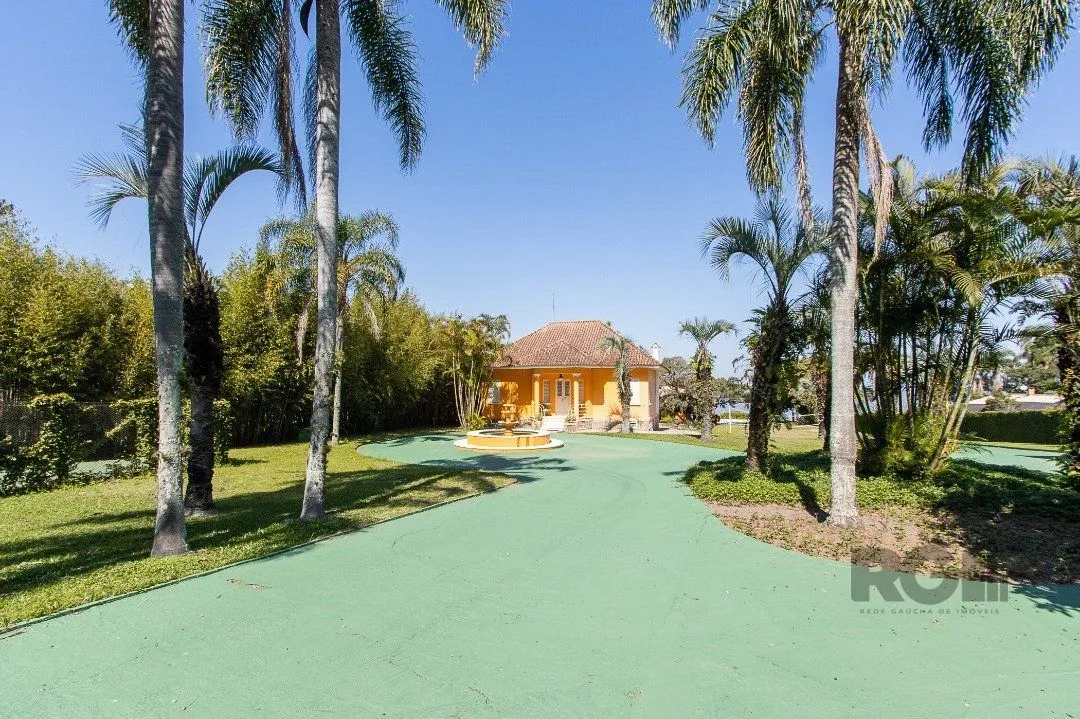 Imagem Terreno de 5.200m², rodeado pela natureza, possuindo 482m² de área construída