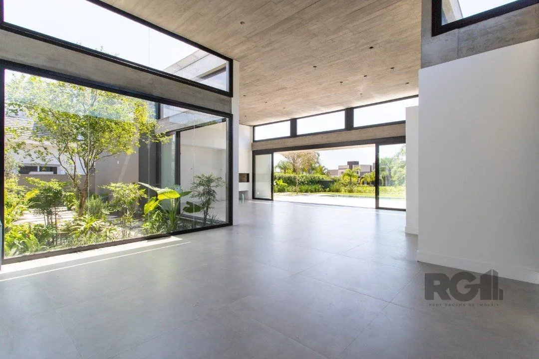 Imagem A Casa Le Mans, uma residência térrea de esquina com 389,48m2 de área coberta