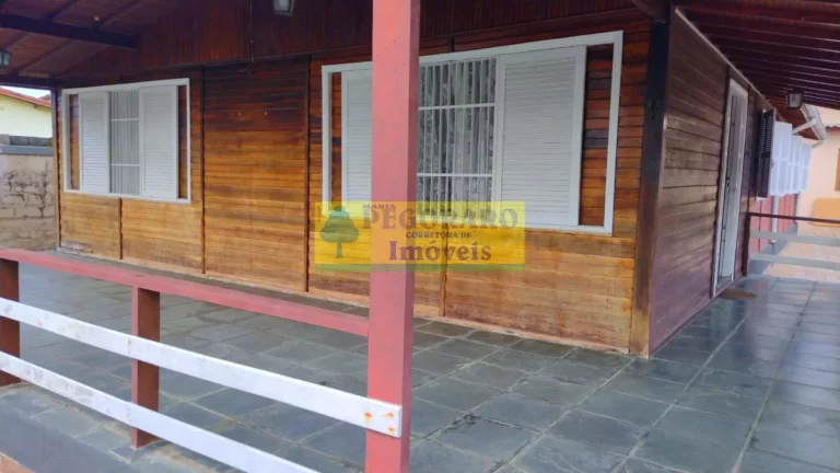 Imagem Imperdível Casa de 4 Quartos na Prainha, Caraguatatuba-SP: 2 Suítes, 2 Salas, 4 Banheiros, 4 Vagas de Garagem!