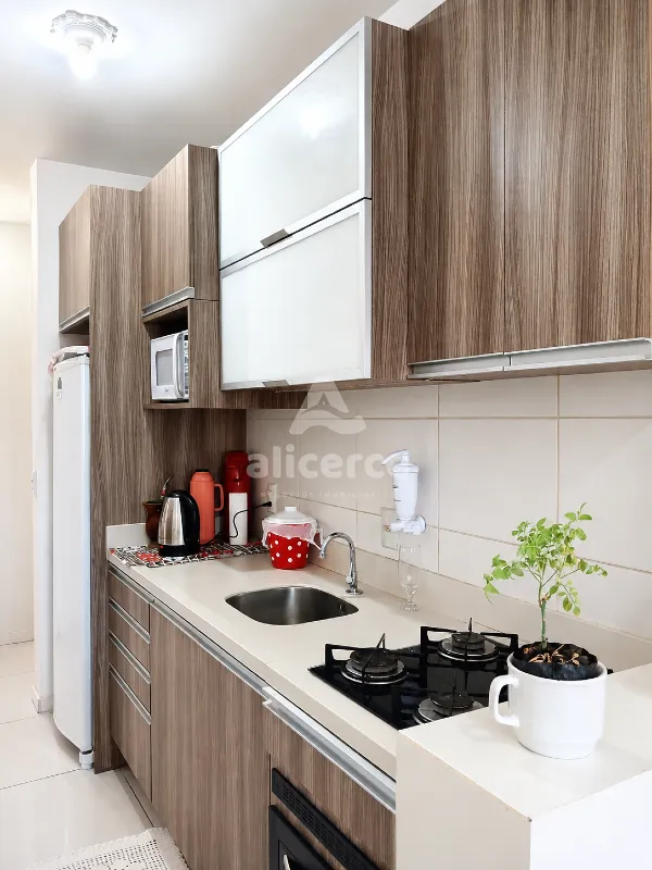 Imagem Apartamento com 2 dormitórios, suíte e churrasqueira na sacada em Areias - São José/SC