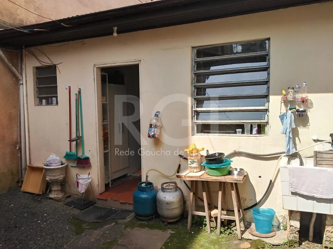 Imagem Casa para Venda - 130m², 2 dormitórios, 1 vaga - Cidade Baixa