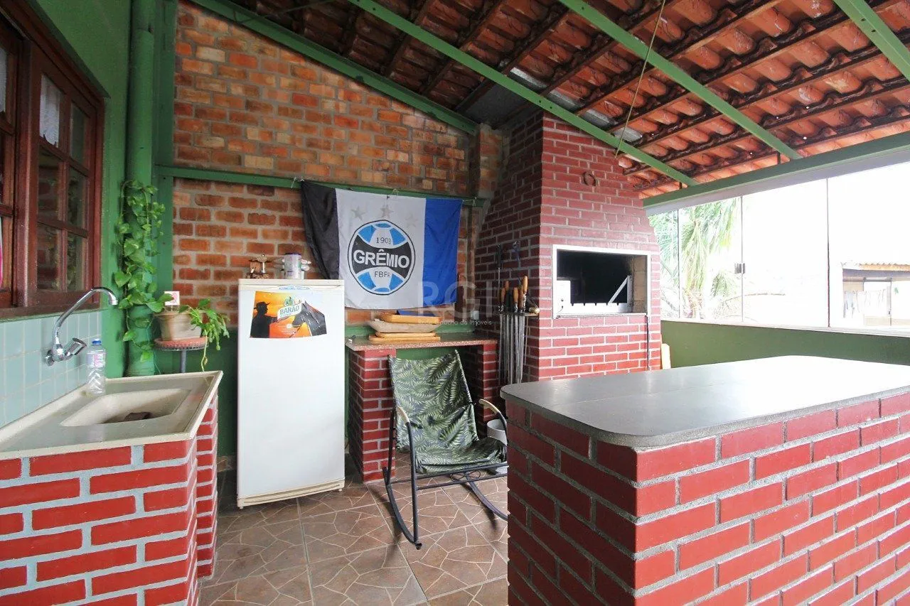 Imagem Casa para Venda - 339m², 3 dormitórios, 2 vagas - Vila Nova, Porto Alegre