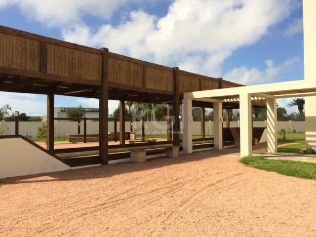 Imagem Excepcional sobrado 5 dormitórios com 5 suítes, totalmente mobiliado e ricamente decorado a beira lago em Xangrilá, no Condomínio Enseada.