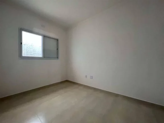 Imagem Casa com 2 dormitórios à venda, 51 m² por R$ 245.000 - Caiçara - Praia Grande/SP