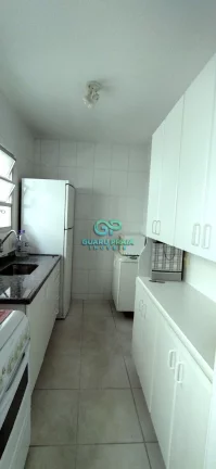 Imagem 2 dormitórios, 2 banheiros, sala para 2 ambientes, cozinha, área de serviço, 1 vaga de garagem