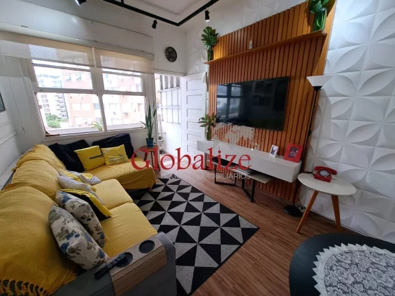 Imagem Apartamento à venda com 94m², 2 quartos, dependência, varanda de frente por R$580.000,00 no Gonzaga em Santos