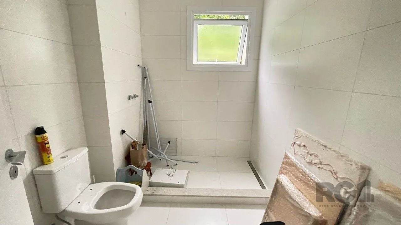 Imagem Casa em condomínio com 3 suítes, no bairro Pedra Redonda, Porto Alegre/RS