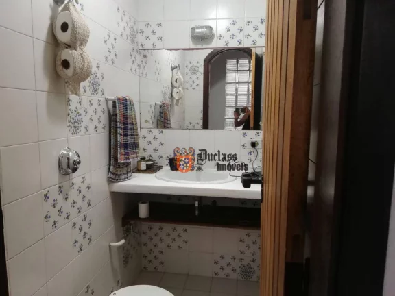 Imagem Casa com 4 dormitórios à venda, 160 m² por R$ 1.000.000 - Balneário Praia do Pernambuco - Guarujá/SP