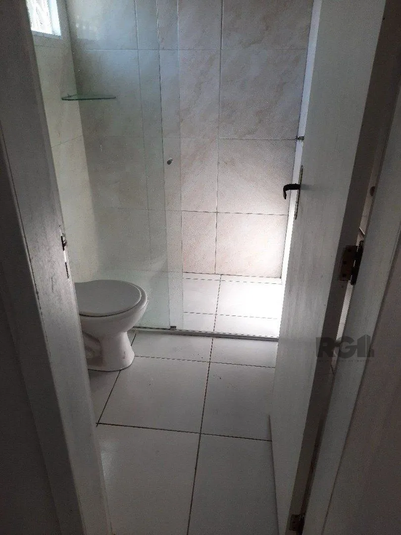 Imagem Oportunidade Imperdível: Prédio com 4 Apartamentos, Pátio e 2 Vagas de Garagem