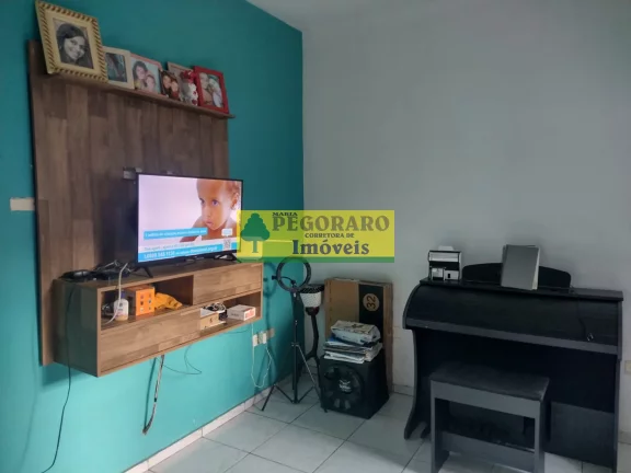 Imagem Casa à venda em Caraguatatuba-SP, bairro Rio do Ouro: 2 quartos, 2 salas, 2 banheiros, 2 vagas de garagem, 127m² - com piscina e churrasqueira!