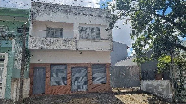 Imagem Casa /Sobrado com apartamento e loja, estacionamento, a venda no Bairro Jardim Itu. Lojão embaixo com dois banheiros e divisórias,