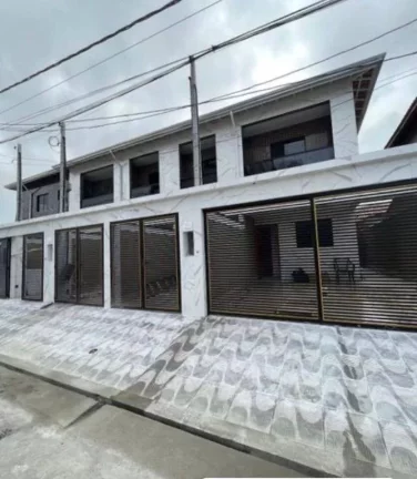 Imagem Sobrado com 2 dormitórios à venda, 60 m² por R$ 390.000,00 - Caiçara - Praia Grande/SP