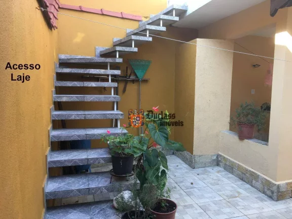 Imagem Casa com 3 dormitórios à venda, 180 m² por R$ 1.100.000 - Vila Guilhermina - Praia Grande/SP