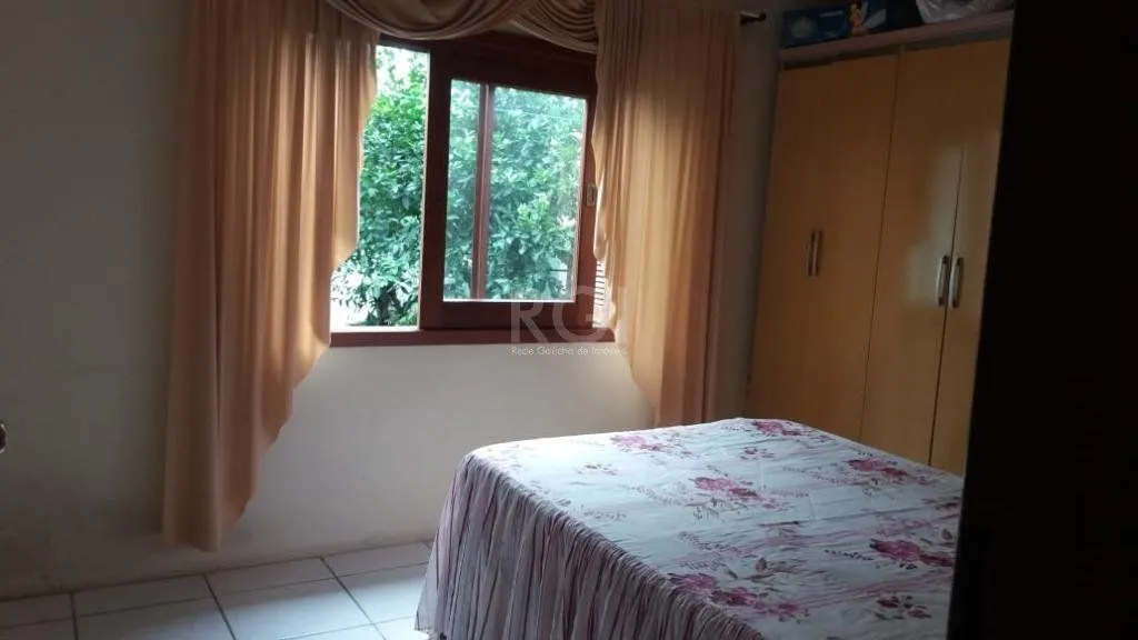 Imagem Casa com 3 dormitórios à venda, 230,11 m² por R$ 900.000,00 - Igara III - Canoas/RS
