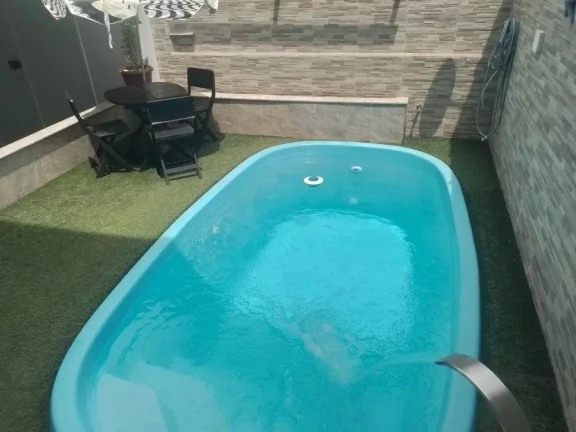 Imagem Linda Casa Alto Padrão - 04 Dormt - 03 Suítes - Ponta da Praia com Piscina.