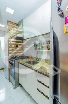Imagem Apartamento com 57m², dois dormitórios sendo uma suíte, living, cozinha tipo americana, área de ...