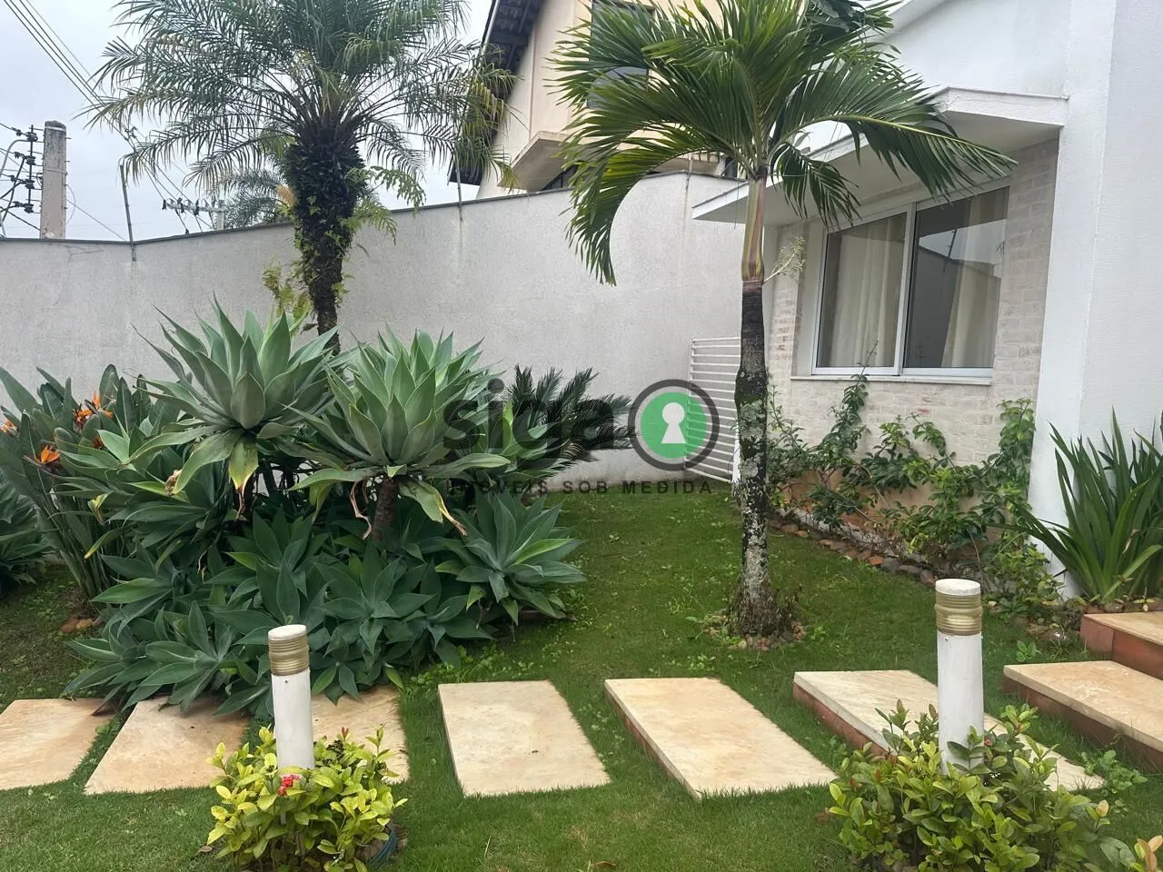 Imagem Oportunidade Casa Ampla com 3 Suítes, Churrasqueira e Área Gourmet