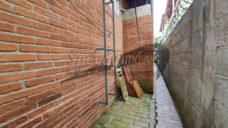 Imagem Sobrado 4 dormitórios no Guarujá, bairro Jardim Vigínia