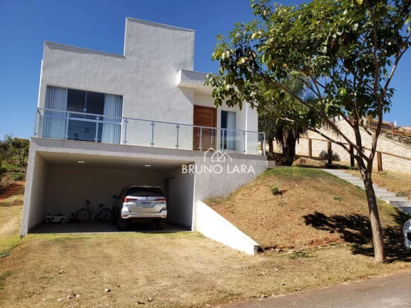Imagem Casa á venda em Mario Campos no Condomínio Serra dos Bandeirantes - Mário Campos/MG