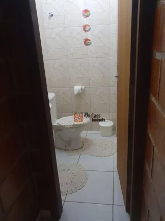 Imagem Sobrado com 2 dormitórios à venda, 70 m² por R$ 375.000 - Pontal de Santa Marina - Caraguatatuba/SP